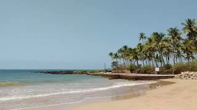 Tarkarli beach with hammock in foreground, Malvan, Konkan, Maharashtra,  India; | Dinodia Photo Library