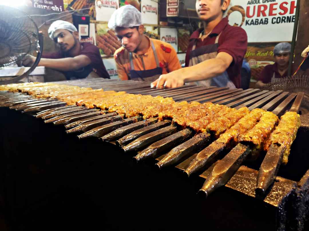 From The Kitchens Of The Mughals Old Delhi Food Walk Tripoto To taste the best kebabs in old delhi the visitors need to walk through the crowded lane of chowri bazar to reach lal kuan bazaar, and you will find the most delicate, supple and definitely the most delicious kebabs at ustaad moinuddin. old delhi food walk